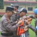Kapolres Maros Laksanakan Apel Gelar Pasukan Operasi Ketupat 2025 Dibawah Guyuran Hujan