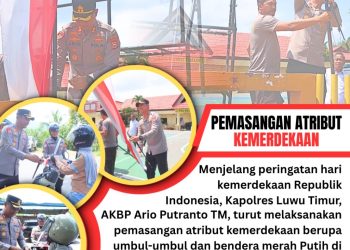 Kapolres Luwu Timur Pasang dan Bagikan Bendera Merah Putih ke Masyarakat