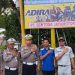Cegah Lakalantas, Kasat Lantas Polres Jeneponto Pimpin Pemasangan Baliho di Jalan Pahlawan