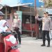 Kapolres Sidrap Turun Langsung Pimpin Gatur Lalin dan Bantu Penyeberangan Anak Sekolah